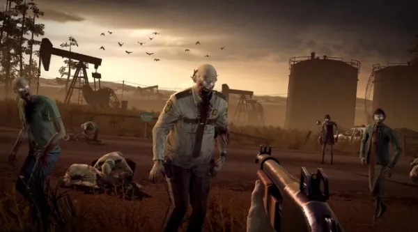 A first-person perspective of a player holding a gun, facing multiple zombies in an industrial setting with oil derricks and silos. The scene is set during sunset or sunrise, with birds flying in the sky and a desolate atmosphere.