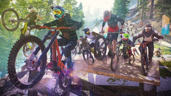 A group of mountain bikers in colorful gear, performing stunts on a wooden ramp amidst a lush forest setting. The scene is vibrant with dynamic action and natural beauty, featuring bright sunlight filtering through the trees.