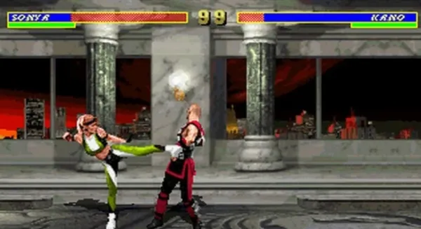 A screenshot from a classic fighting video game, featuring two characters engaged in combat. The character on the left is wearing green and white attire with a headband, while the character on the right is dressed in red and black clothing with a headband as well. They are positioned in front of a cityscape background with tall buildings and a sunset sky. The health bars for "SONYA" and "KANO" are displayed at the top corners of the screen.