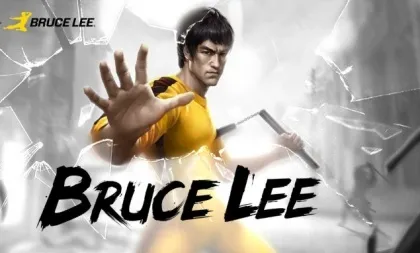 A dynamic and powerful image of Bruce Lee in a yellow jumpsuit, breaking through glass with his hand. The background is shattered glass, emphasizing the intensity and strength of his action. The text "Bruce Lee" prominently displayed at the bottom.