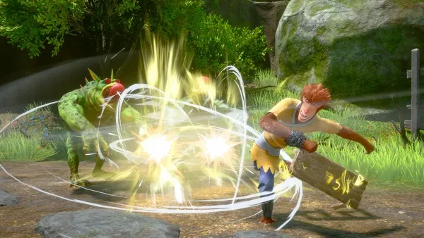 A young man with red hair, wearing a yellow top and blue pants, is engaged in an intense battle with a green dragon-like creature. The man wields a wooden shield emblazoned with golden symbols as his weapon of choice. The scene takes place outdoors amidst lush greenery and large rocks, with the man casting a powerful spell or attack that emits bright light and energy waves. The atmosphere is charged with action and adventure.